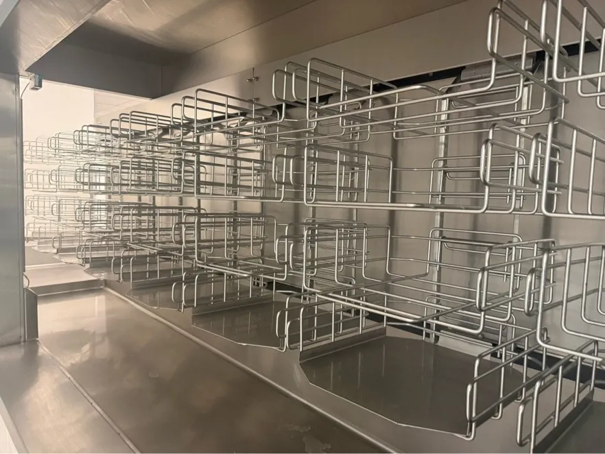Dish room tray racks and stainless counters after cleaning